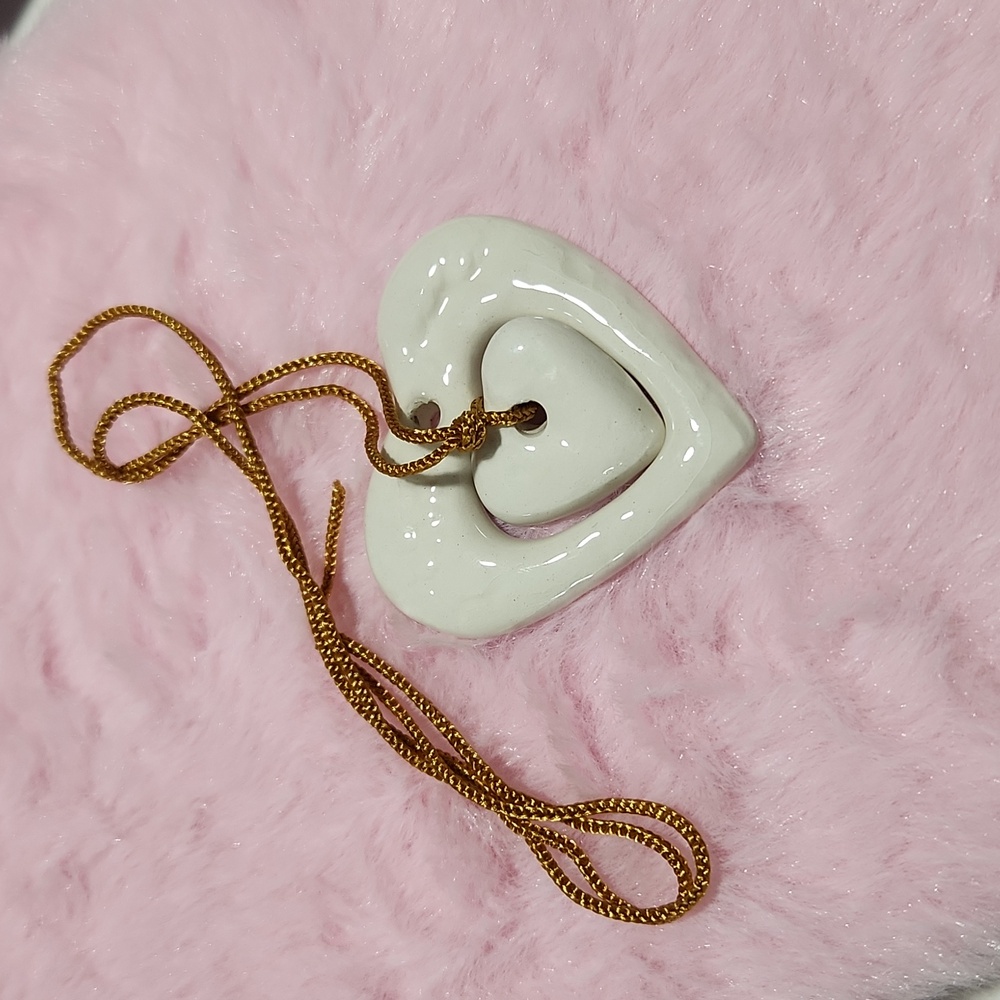 The Rembering White 🤍 Heart with gold string